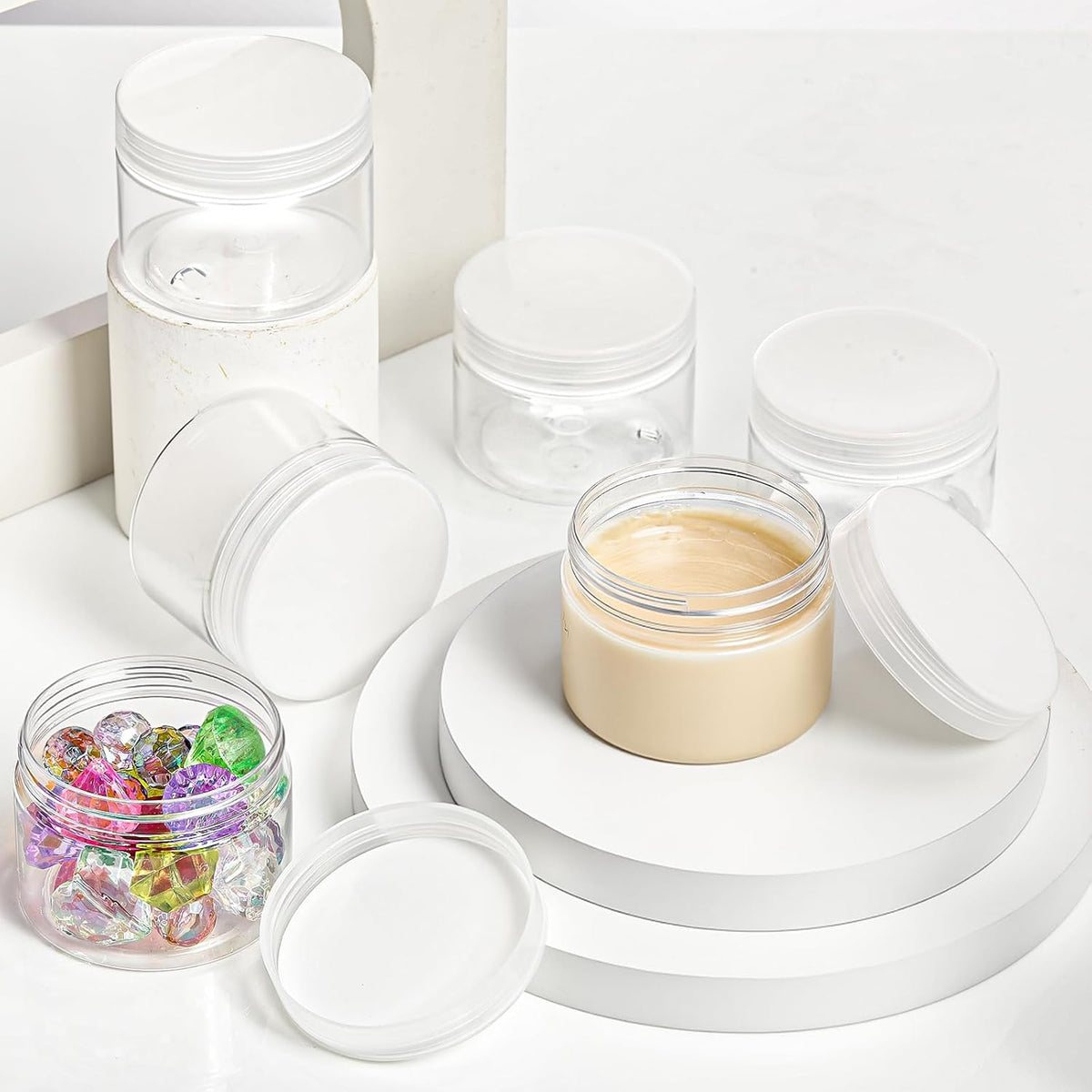SATINIOR 24 Pieces Empty Clear Plastic Jars with Lids Round Storage Containers Wide-Mouth for Beauty Product Cosmetic Cream Lotion Liquid Butter Craft and Food (Transparent Lid, 1 oz)